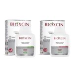 شامپو مو گیاهی بیوکسین Bioxcin ضد ریزش مو خشک/چرب/انواع مو 300 میل سفید